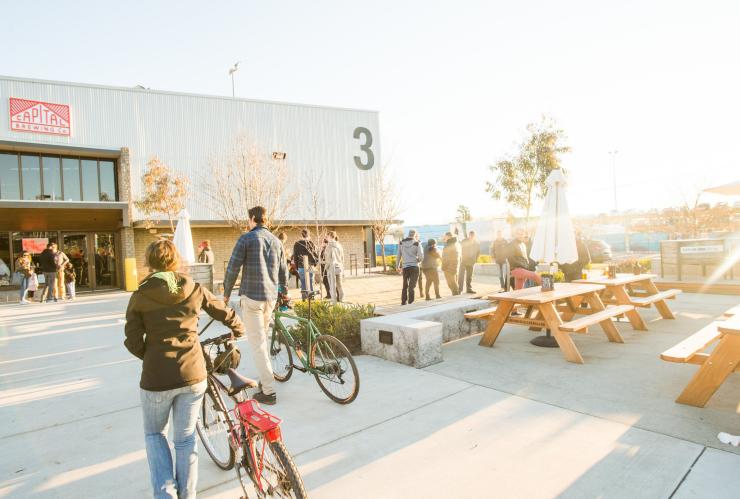 Cyclists arriving at Capital Brewing Co at the Dairy Road precinct in Fyshwick © VisitCanberra Cyclists arriving at Capital Brewing Co at the Dairy Road precinct in Fyshwick © VisitCanberra