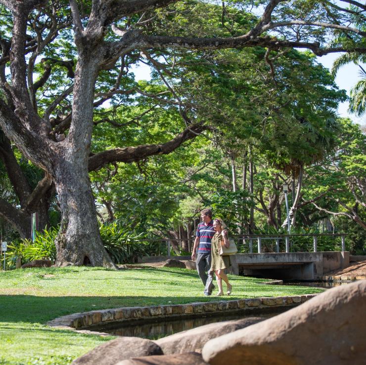 Couple walking through the George Brown Darwin Botanic Gardens in Darwin © Tourism NT/Shaana McNaught
