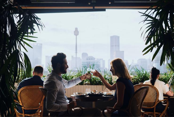 Couple enjoying a cocktail at The Butler in Potts Point, New South Wales © Destination NSW