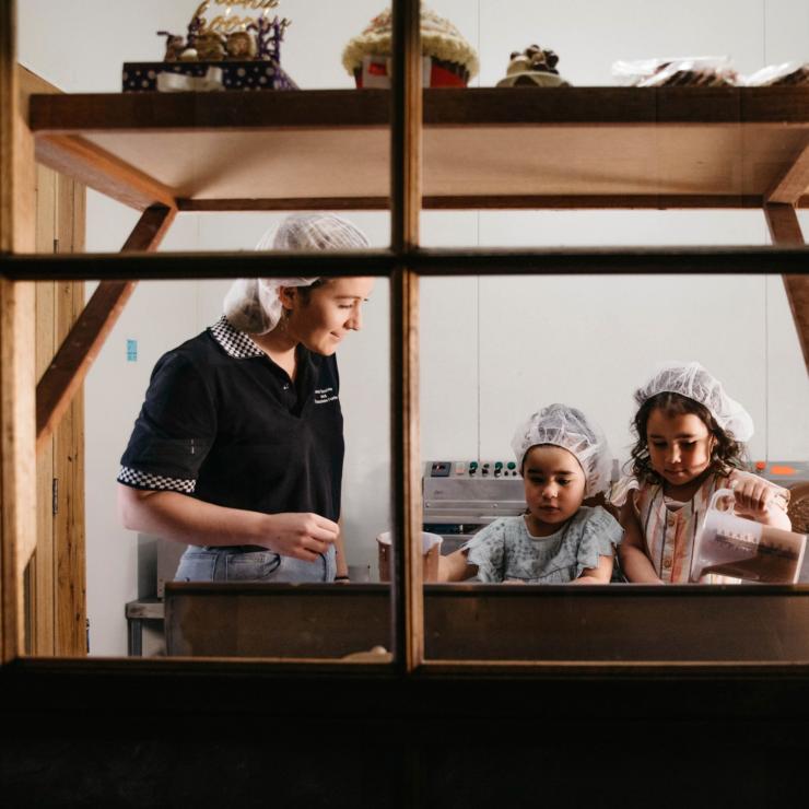 Young girls enjoying a chocolate making lesson at Junee Licorice & Chocolate Factory © Destination NSW Young girls enjoying a chocolate making lesson at Junee Licorice & Chocolate Factory © Destination NSW