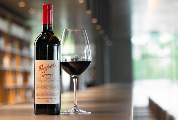 Glass and bottle of Penfolds Grange wine © Penfolds