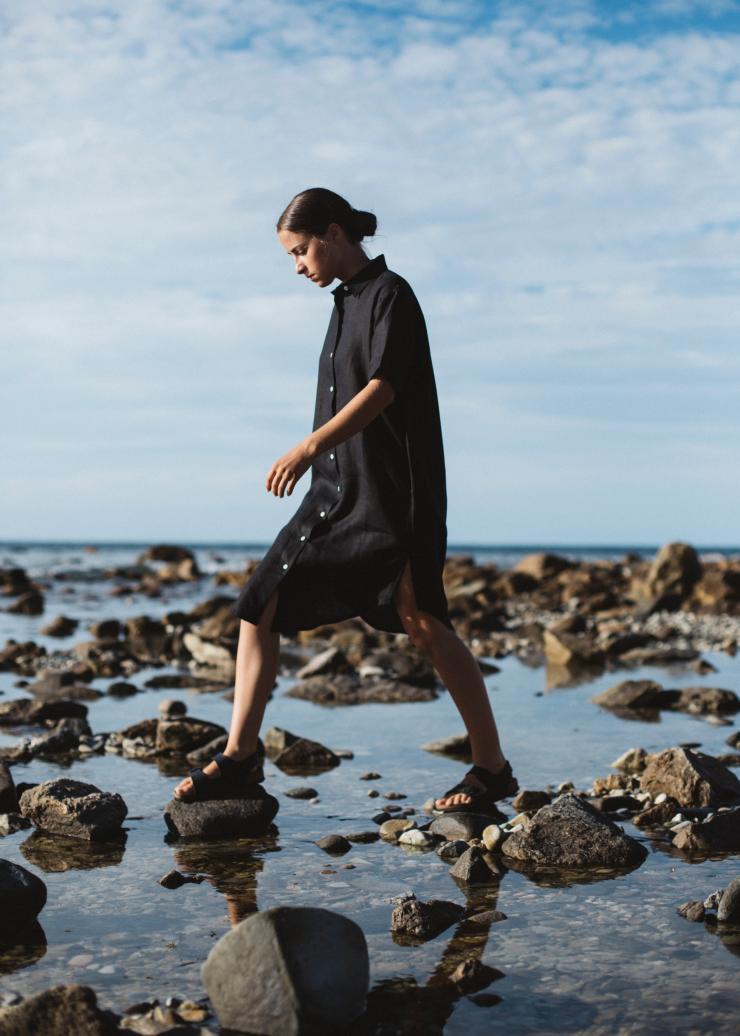 Woman walking over rock pools wearing clothing by Good Studios in Adelaide © Bing Rowland Woman walking over rock pools wearing clothing by Good Studios in Adelaide © Bing Rowland