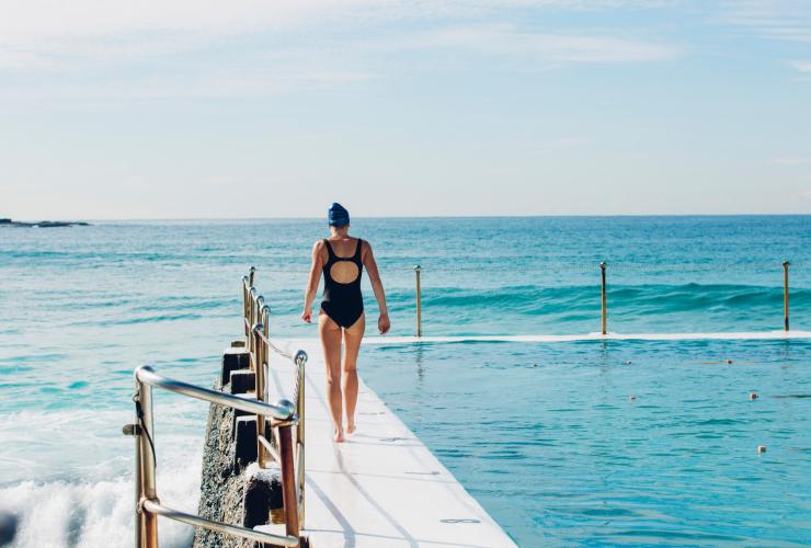 Woman out for a morning swim at Bondi Icebergs at Bondi Beach in New South Wales © Destination NSW/Issac Brown