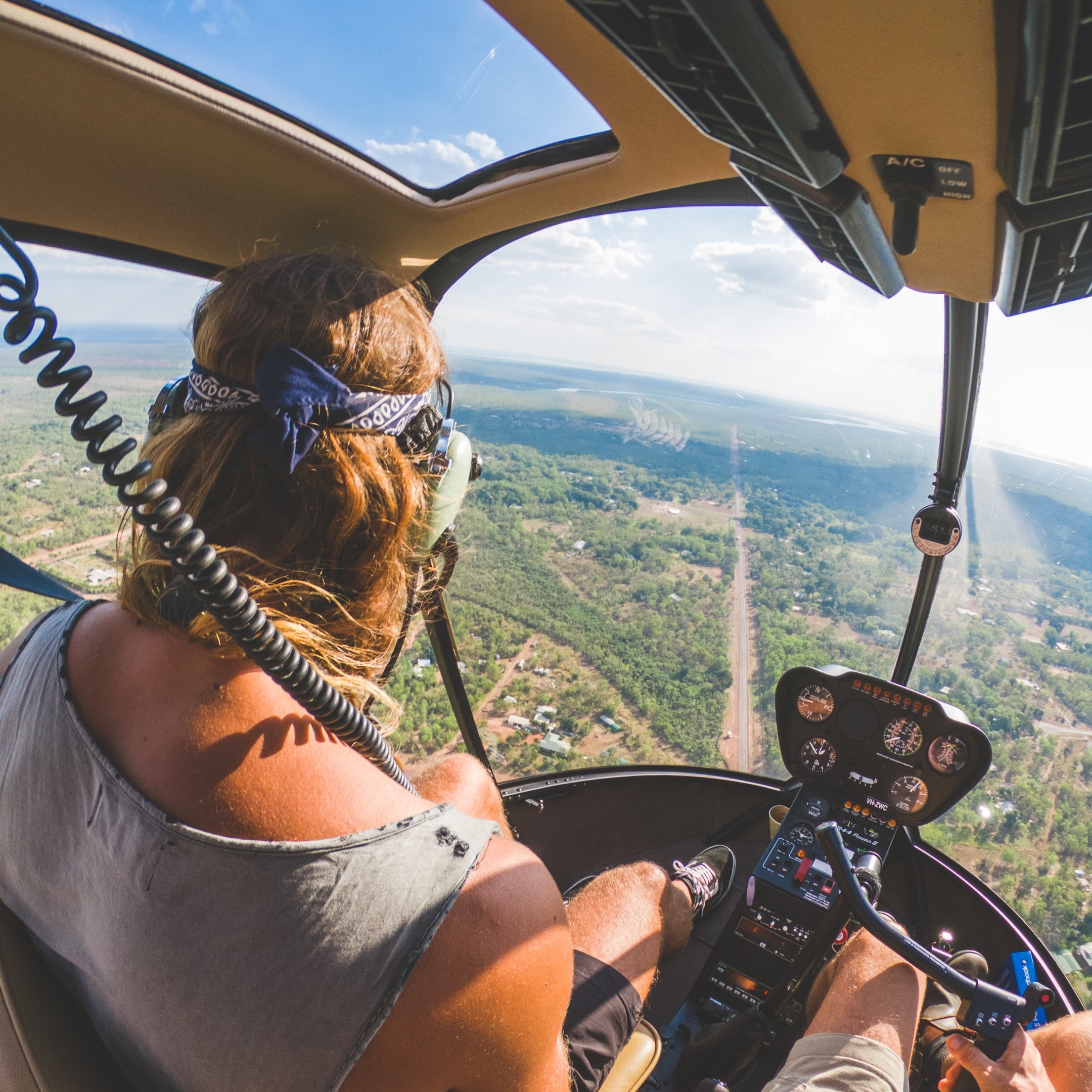 Girl in helicopter over Litchfield National park © Tourism NT - Dan Moore