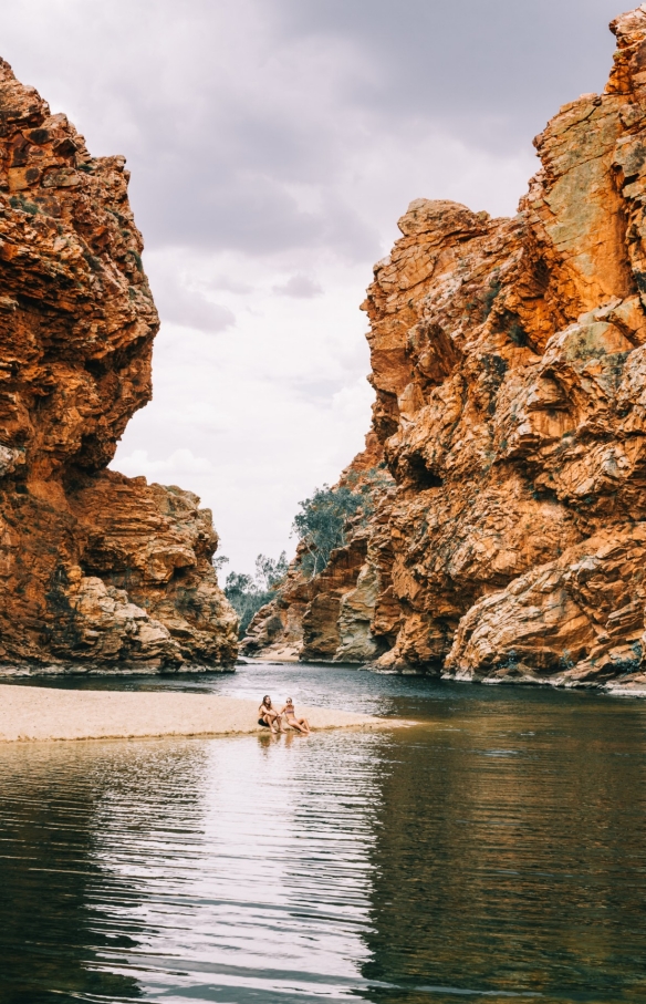 Relaxing at Ellery Creek Big Hole, West MacDonnell Ranges, NT © Tourism NT, Laura Bell