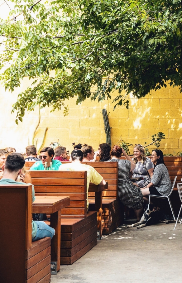 Outdoor dining area at Oddio bar near Bowden © @josiewithers / @oddiobowden