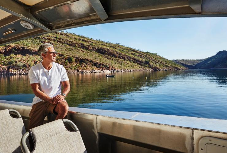 Man on a boat cruise on Lake Argyle in the Kimberley region © Tourism Western Australia Man on a boat cruise on Lake Argyle in the Kimberley region © Tourism Western Australia