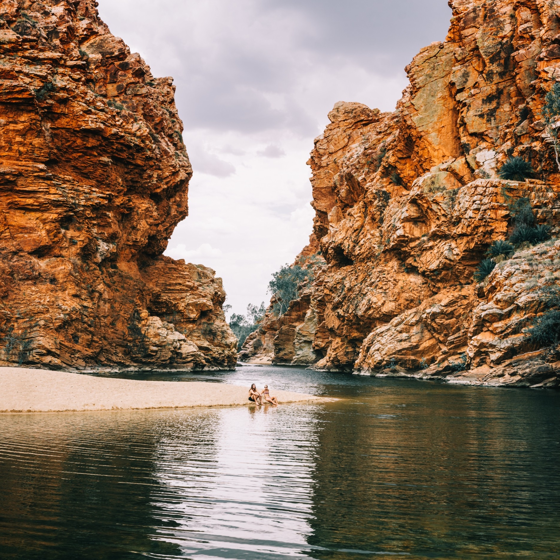 Two people relaxing at Ellery Creek Big Hole © Tourism NT/Laura Bell 2017