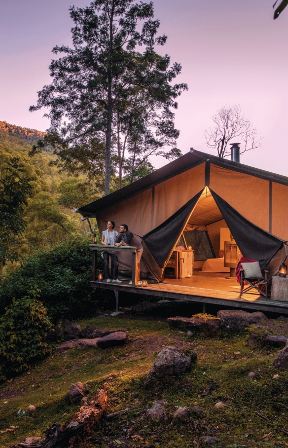 Couple at Nightfall Wilderness Camp in Lamington National Park © Tourism & Events Queensland