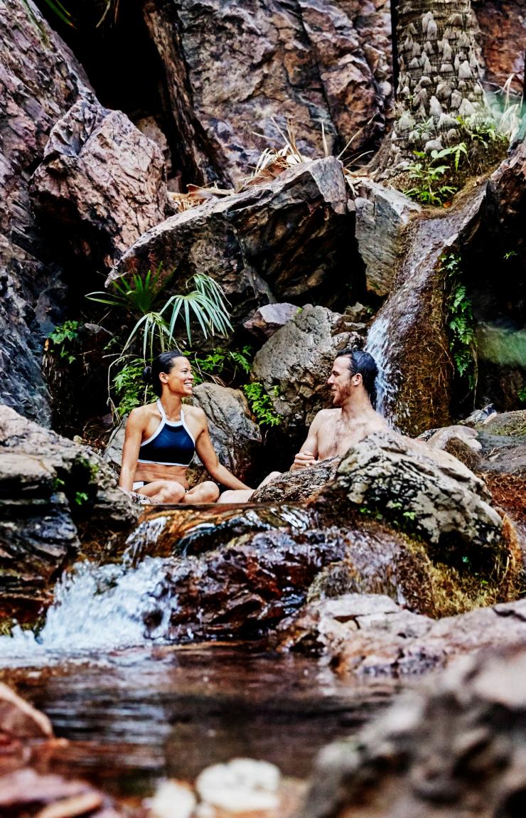 Couple relaxing among the natural springs and greenery of Zebedee Springs, El Questro Wilderness Park, Western Australia © Tourism Western Australia Couple relaxing among the natural springs and greenery of Zebedee Springs, El Questro Wilderness Park, Western Australia © Tourism Western Australia