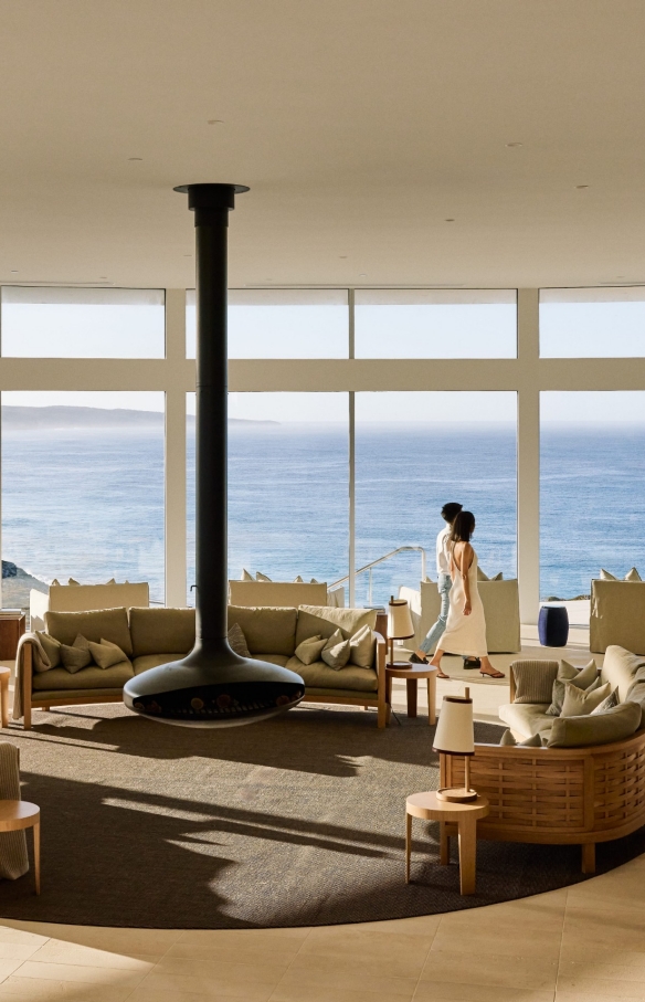 Couple walking through the beautifully appointed lounge area of Southern Ocean Lodge, Kangaroo Island, South Australia © South Australian Tourism Commission