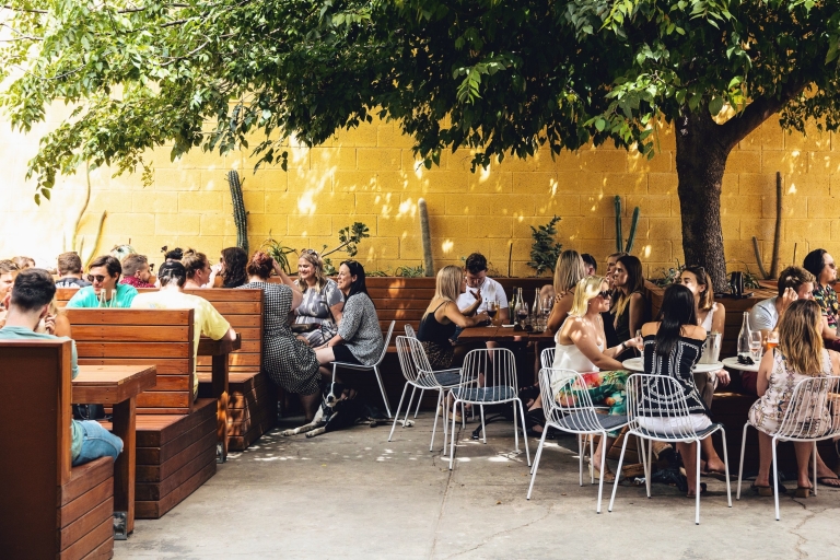 Outdoor dining area at Oddio bar near Bowden © @josiewithers / @oddiobowden