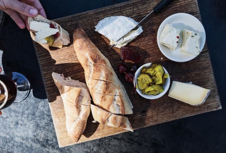 Aerial view over a platter of cheese, pickles, cherries and bread at Bruny Island Cheese Co., Bruny Island, Tasmania © Adam Gibson
