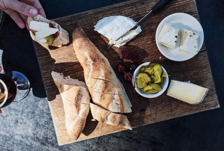 Aerial view over a platter of cheese, pickles, cherries and bread at Bruny Island Cheese Co., Bruny Island, Tasmania © Adam Gibson