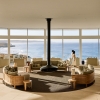Couple walking through the beautifully appointed lounge area of Southern Ocean Lodge, Kangaroo Island, South Australia © South Australian Tourism Commission