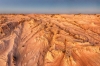 Aerial view over the rugged sand and clay formations of the Walls of China, Mungo National Park, New South Wales © Destination NSW