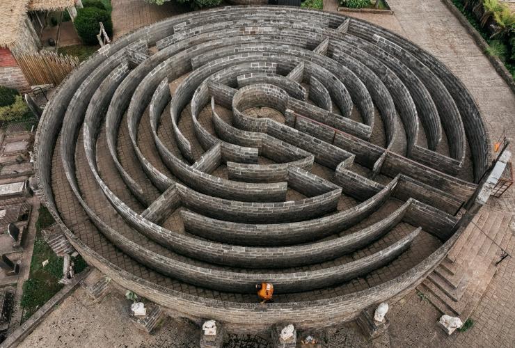 Aerial view over a mother and child exploring a stone maze at Kryal Castle, Ballarat, Victoria © Tourism Australia/Visit Victoria
