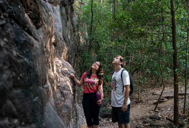 Two friends admiring the flora on a bush walk near Mercure Kakadu Crocodile Hotel during a working holiday, Kakadu, Northern Territory © Tourism NT/Kane Chenoweth