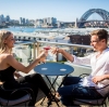 Aster Bar rooftop bar overlooking Harbour Bridge and Opera House, Sydney, New South Wales © Tourism Australia